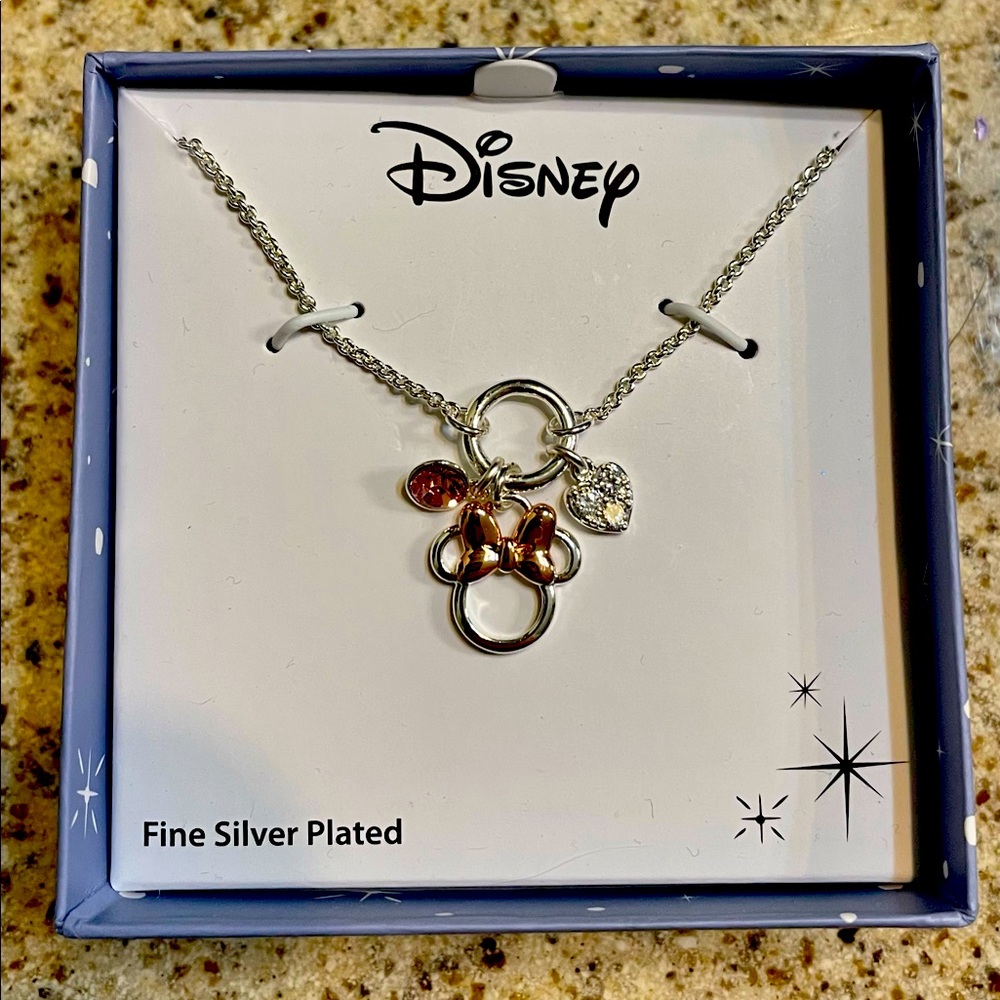 Brass plated Minnie Mouse crystal charms 16  inch with addl 2 inch necklace.